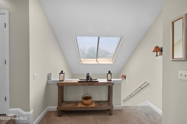 1710 Deerfield Ct SW Unit 4A, Ocean Isle Beach, NC 28469 - detailed view of carpet flooring, a skylight, and baseboards