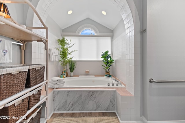 1710 Deerfield Ct SW Unit 4A, Ocean Isle Beach, NC 28469 - full bath with lofted ceiling and a garden tub