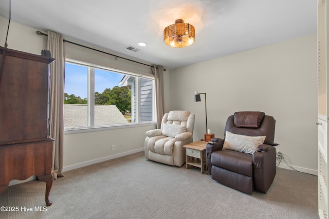 1710 Deerfield Ct SW Unit 4A, Ocean Isle Beach, NC 28469 - sitting room with carpet and baseboards