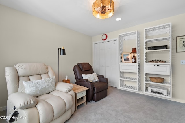 1710 Deerfield Ct SW Unit 4A, Ocean Isle Beach, NC 28469 - living area featuring carpet flooring