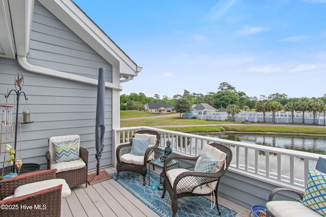 1710 Deerfield Ct SW Unit 4A, Ocean Isle Beach, NC 28469 - wooden deck featuring a water view