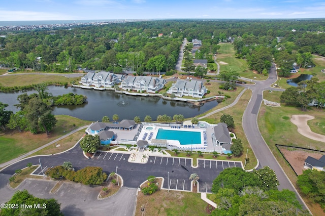 1710 Deerfield Ct SW Unit 4A, Ocean Isle Beach, NC 28469 - view of property location featuring a large body of water and a pool area