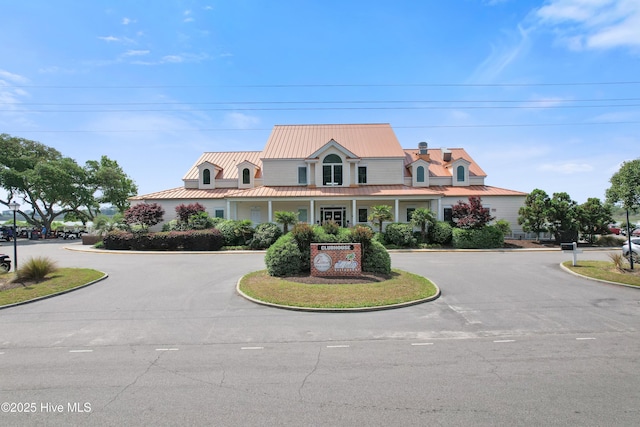 1710 Deerfield Ct SW Unit 4A, Ocean Isle Beach, NC 28469 - country-style home with curved driveway and metal roof