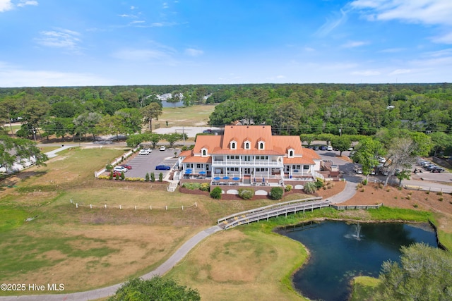 1710 Deerfield Ct SW Unit 4A, Ocean Isle Beach, NC 28469 - bird's eye view of a nearby body of water and a forest