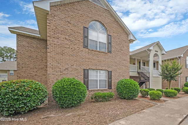 2910 Mulberry Ln Unit B, Greenville, NC 27858 - view of property exterior featuring brick siding and stairway