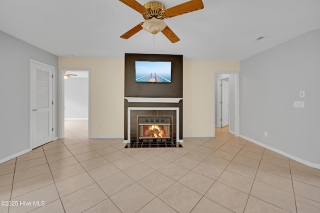 2910 Mulberry Ln Unit B, Greenville, NC 27858 - unfurnished living room featuring a ceiling fan, a tiled fireplace, and tile patterned floors