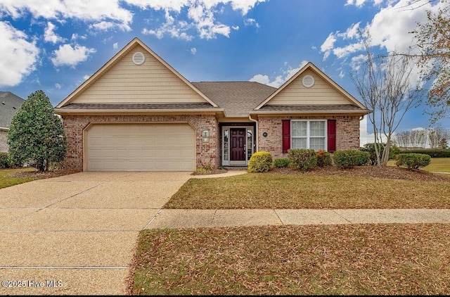 ranch-style home with a garage, a front lawn, roof with shingles, brick siding, and driveway