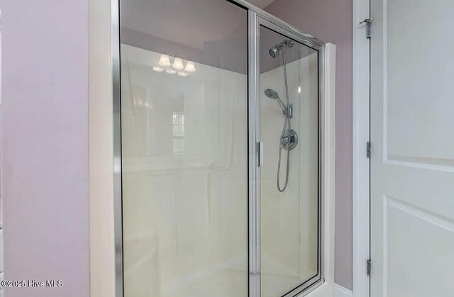 bathroom featuring a stall shower