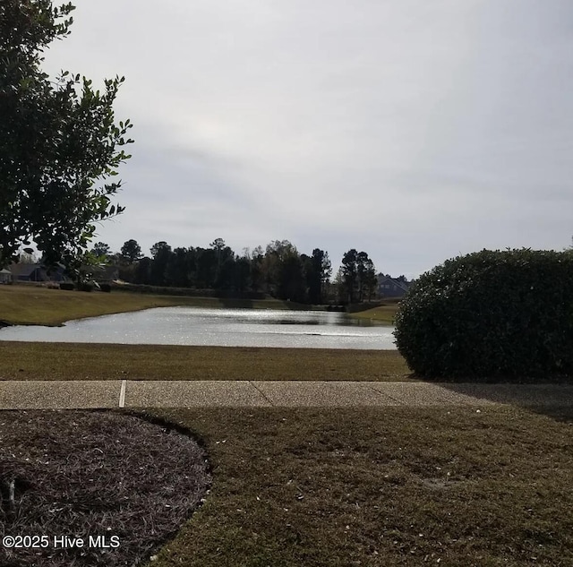 exterior space with a water view