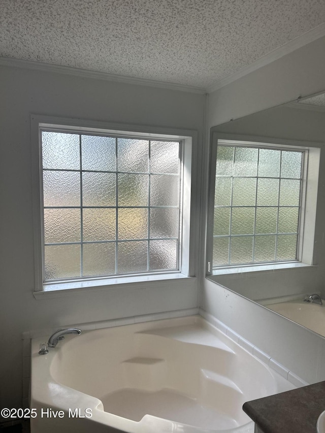 full bathroom with crown molding, plenty of natural light, and a garden tub