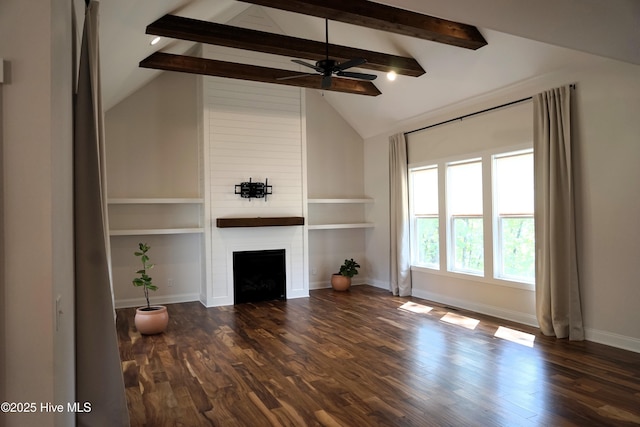 unfurnished living room with a ceiling fan, wood finished floors, a fireplace, baseboards, and lofted ceiling with beams