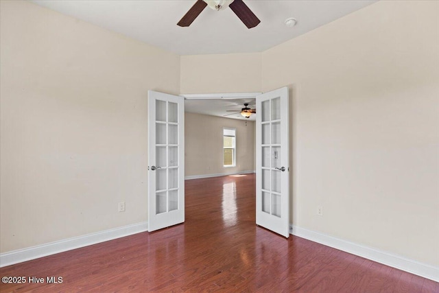 unfurnished room featuring a ceiling fan, french doors, and wood finished floors