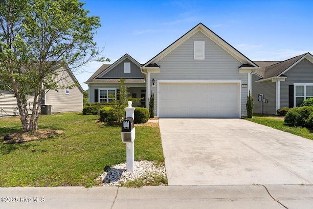 view of front of house with a garage, board and batten siding, a front yard, and concrete driveway