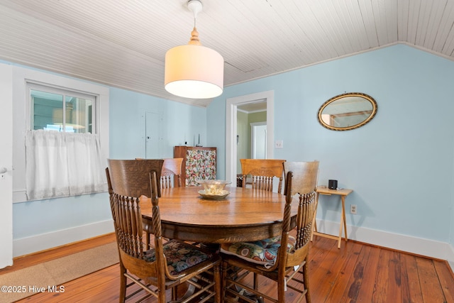 312 E W St, Southport, NC 28461 - dining space featuring wooden ceiling, hardwood / wood-style flooring, lofted ceiling, and baseboards