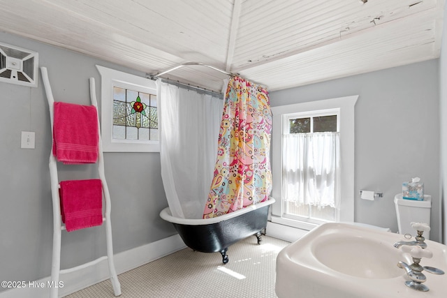 312 E W St, Southport, NC 28461 - bathroom with a sink and a freestanding tub