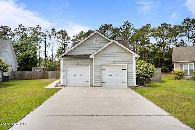 garage featuring driveway and central AC unit