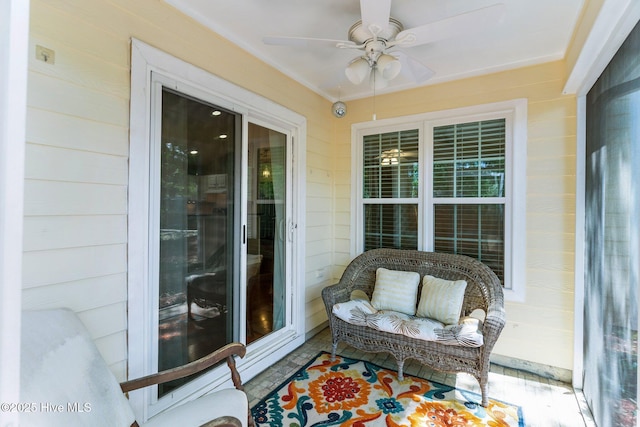 exterior space featuring a ceiling fan