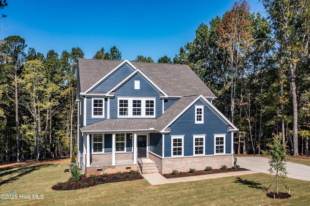 231 Dona Dr, Carthage, NC 28327 - craftsman-style home with a porch, brick siding, and a front yard