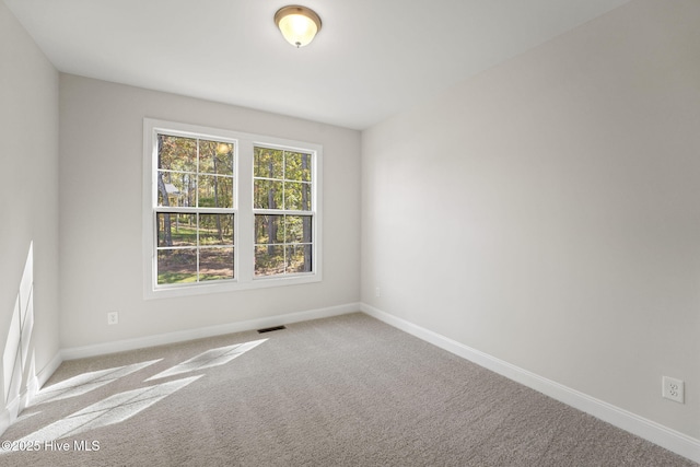 231 Dona Dr, Carthage, NC 28327 - spare room with carpet floors and baseboards