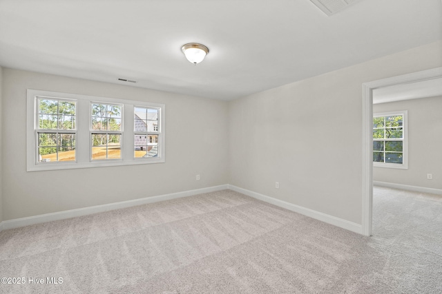 231 Dona Dr, Carthage, NC 28327 - unfurnished room featuring carpet, healthy amount of natural light, and baseboards