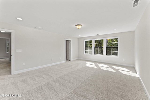 231 Dona Dr, Carthage, NC 28327 - spare room with carpet flooring, baseboards, and recessed lighting