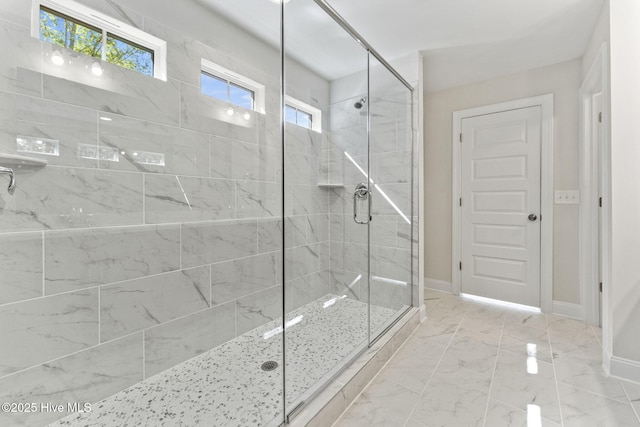 231 Dona Dr, Carthage, NC 28327 - bathroom with a stall shower, baseboards, and marble look tile flooring