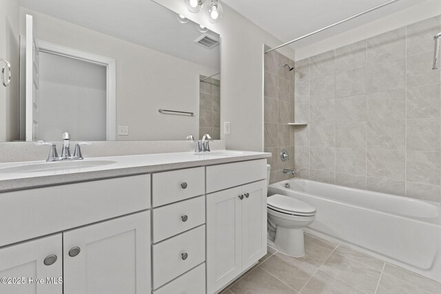 231 Dona Dr, Carthage, NC 28327 - bathroom with tile patterned flooring, bathtub / shower combination, toilet, and double vanity