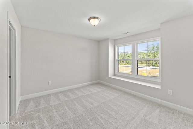 231 Dona Dr, Carthage, NC 28327 - carpeted empty room featuring baseboards