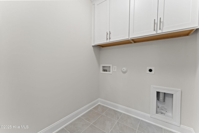 231 Dona Dr, Carthage, NC 28327 - washroom featuring cabinet space, electric dryer hookup, gas dryer hookup, baseboards, and washer hookup