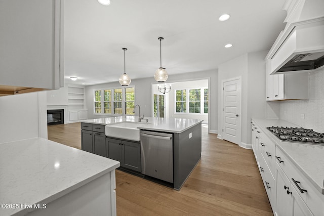 231 Dona Dr, Carthage, NC 28327 - kitchen with stainless steel appliances, a sink, custom range hood, recessed lighting, and tasteful backsplash