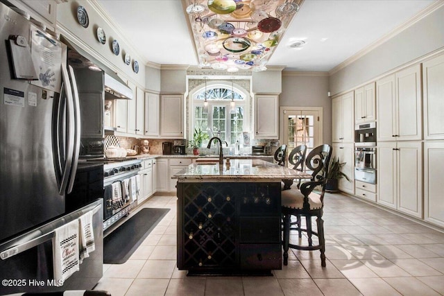 kitchen featuring freestanding refrigerator, a warming drawer, light tile patterned flooring, and high end range