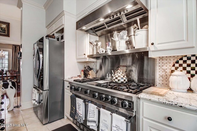 kitchen with crown molding, light tile patterned flooring, stainless steel appliances, decorative backsplash, and range hood