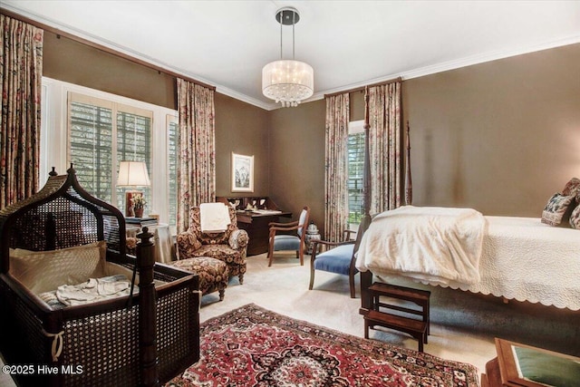 bedroom with crown molding and carpet