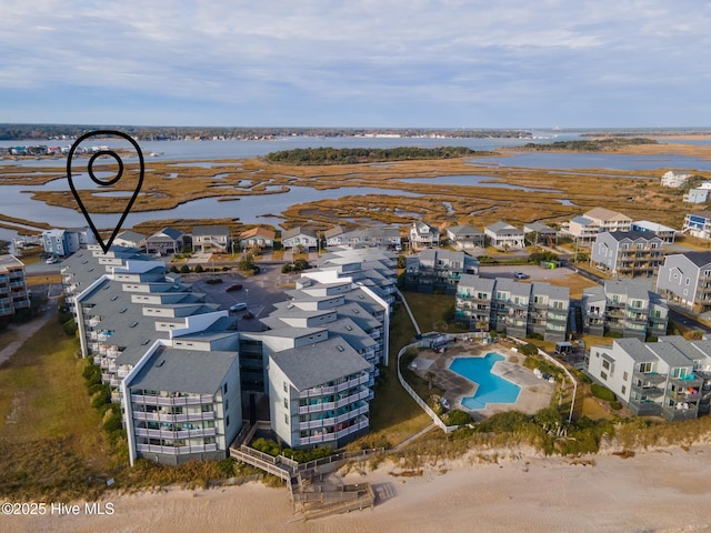 1896 New River Inlet Rd Unit 1402, North Topsail Beach, NC 28460 - bird's eye view of a pool area and a large body of water