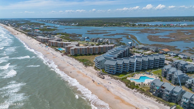aerial view featuring a water view and a view of the beach
