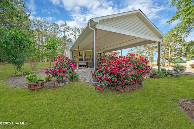 view of yard with a porch
