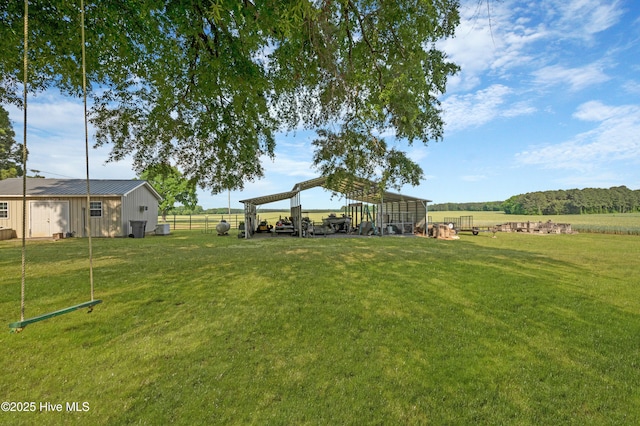 view of yard featuring a rural view