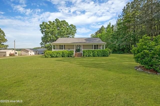 view of front facade featuring covered porch and a front lawn