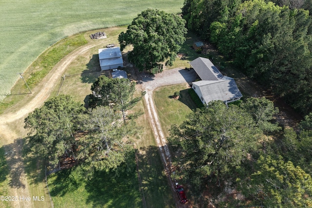 birds eye view of property featuring a rural view