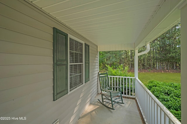 balcony featuring a porch