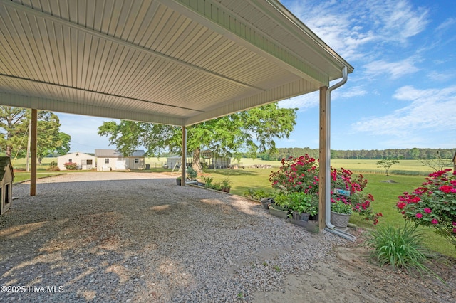 view of yard with a carport