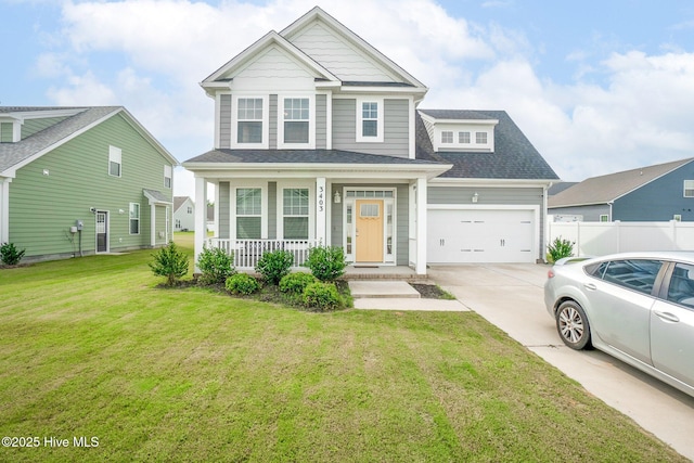 view of front facade featuring a porch, an attached garage, driveway, a front lawn, and a shingled roof