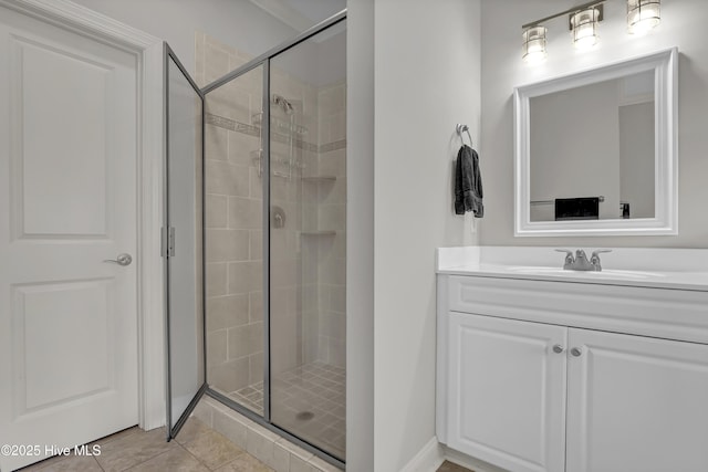 8130 Porters Crossing Way, Wilmington, NC 28411 - bathroom featuring a shower stall, vanity, and tile patterned floors