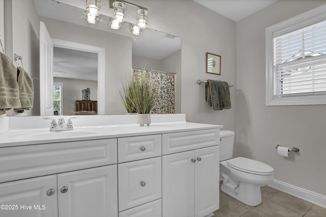8130 Porters Crossing Way, Wilmington, NC 28411 - full bathroom featuring tile patterned floors, toilet, vanity, baseboards, and a shower with shower curtain