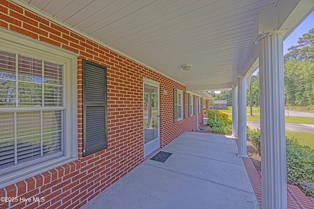view of patio featuring a porch