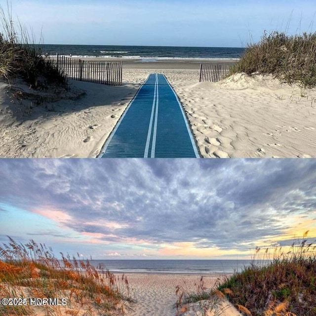 view of community featuring view of water and beach
