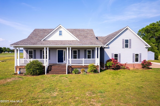 farmhouse inspired home with a porch, a shingled roof, and a front yard