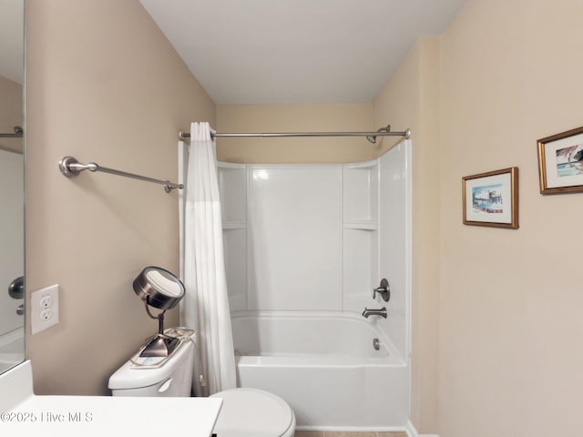 bathroom featuring toilet, shower / bathtub combination with curtain, and vanity