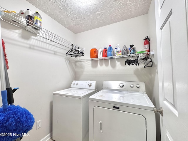 212 Red Carnation Dr, Holly Ridge, NC 28445 - washroom featuring washer and clothes dryer and a textured ceiling