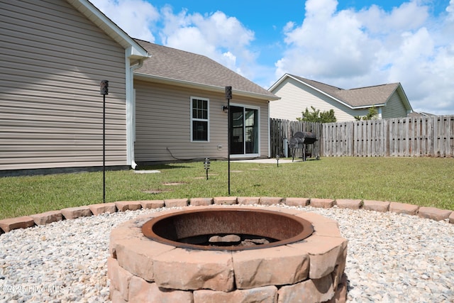 212 Red Carnation Dr, Holly Ridge, NC 28445 - view of yard with a fire pit